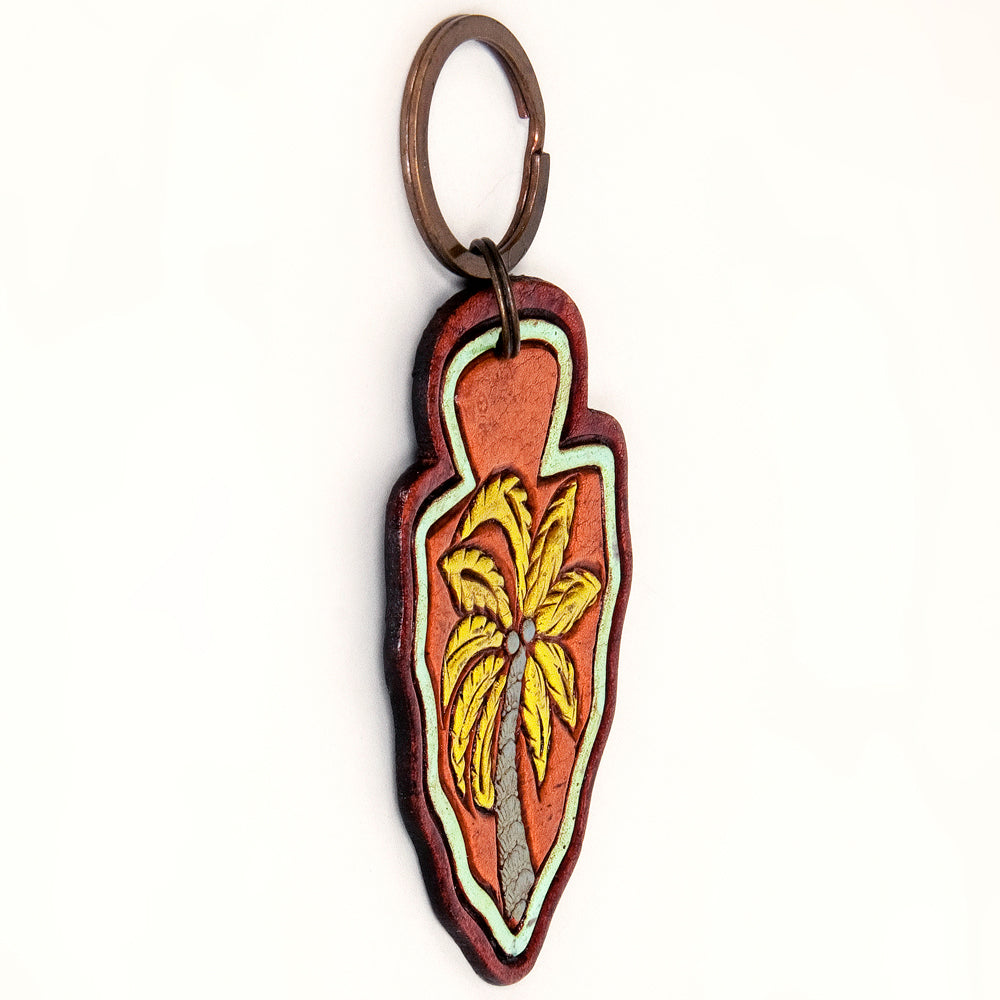 LC-ADKR208 Hand-Tooled Leather Keyring Arrowhead Shape with Green Cactus & Red Speckled Background