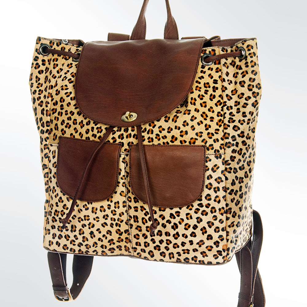 ADBGI110 Tooled Leather Western Backpack - Hair-On Hide with Floral Carving
