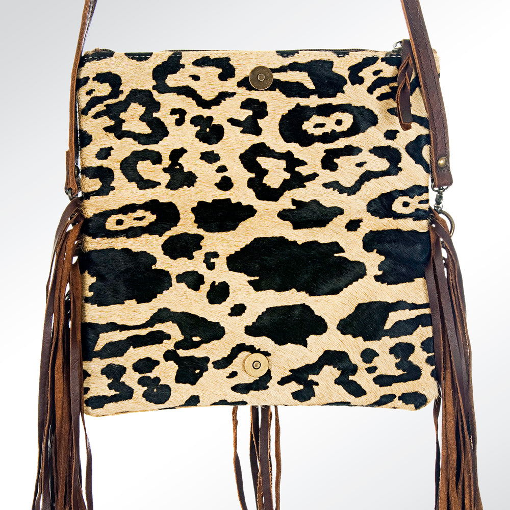 ADBG526 Hair-On Cowhide Shoulder Bag with Hand-Tooled Leather Floral Panel & Fringe