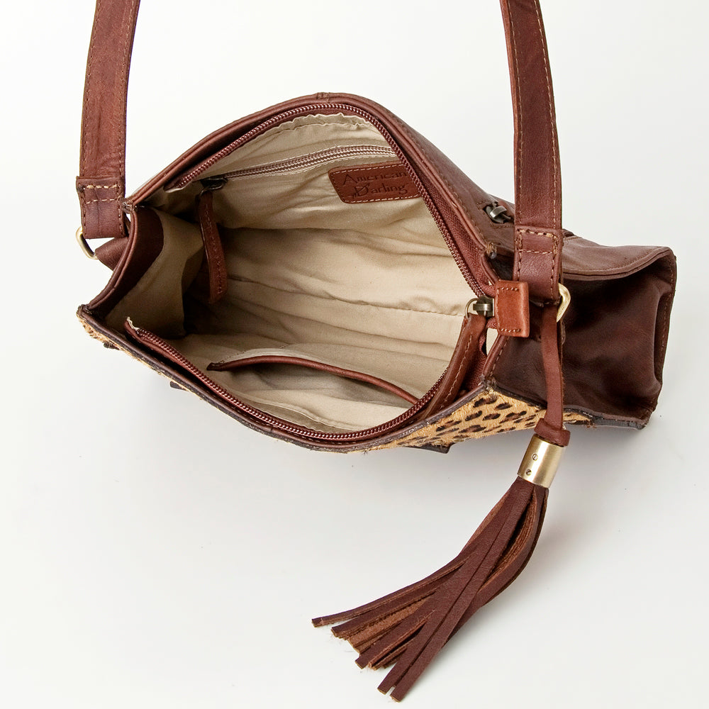 ADBGI166 Natural Hair On Tooled Leather Crossbody - Turquoise Concho Accent