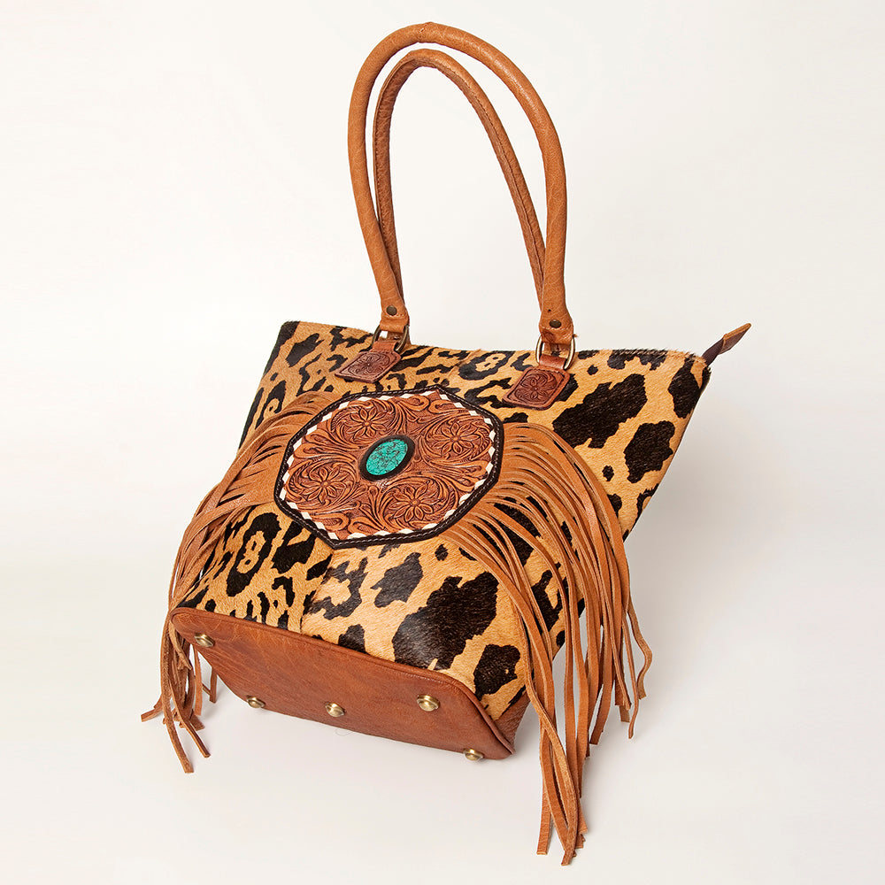 LC-ADBGA208 Hair-On Cowhide Tote with Tooled Leather Medallion, Fringe & Turquoise Accent