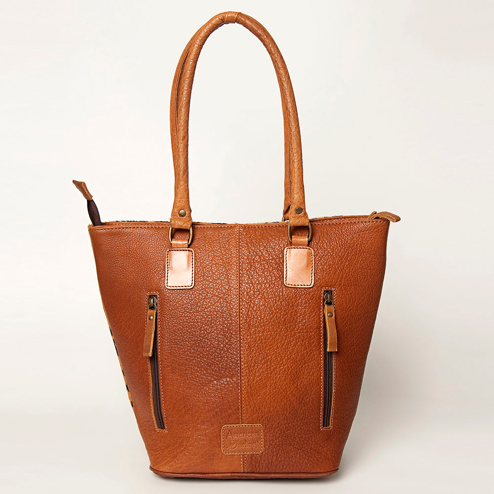 LC-ADBGA208 Hair-On Cowhide Tote with Tooled Leather Medallion, Fringe & Turquoise Accent