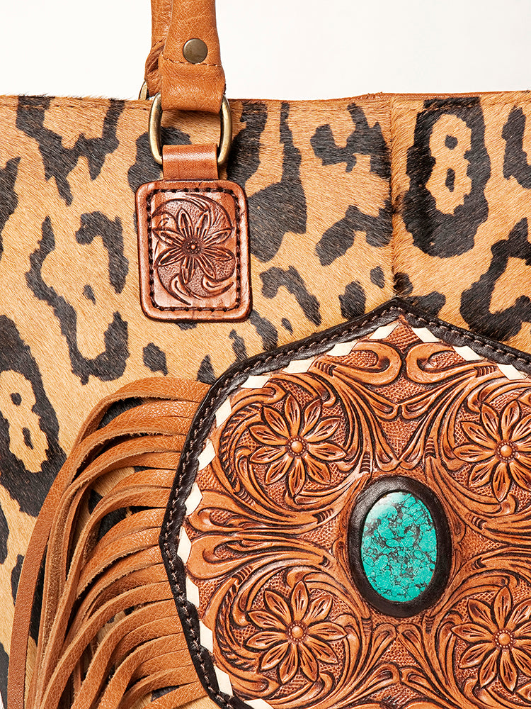 LC-ADBGA208 Hair-On Cowhide Tote with Tooled Leather Medallion, Fringe & Turquoise Accent