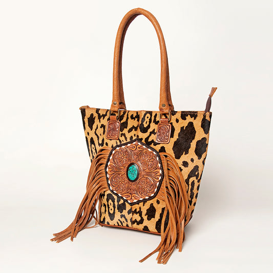 LC-ADBGA208 Hair-On Cowhide Tote with Tooled Leather Medallion, Fringe & Turquoise Accent