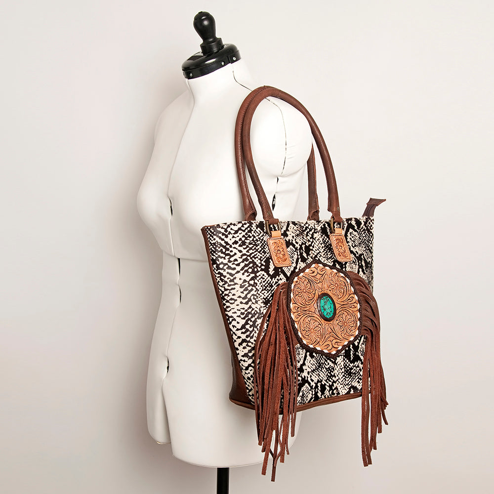 LC-ADBGA208 Hair-On Cowhide Tote with Tooled Leather Medallion, Fringe & Turquoise Accent