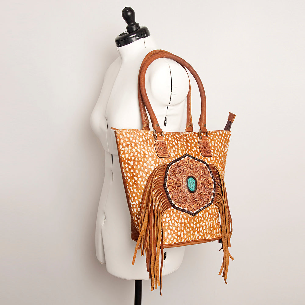 LC-ADBGA208 Hair-On Cowhide Tote with Tooled Leather Medallion, Fringe & Turquoise Accent