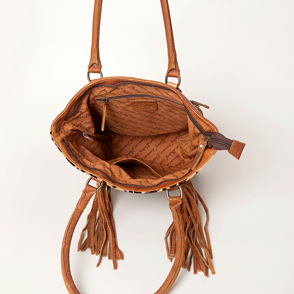 LC-ADBGA208 Hair-On Cowhide Tote with Tooled Leather Medallion, Fringe & Turquoise Accent