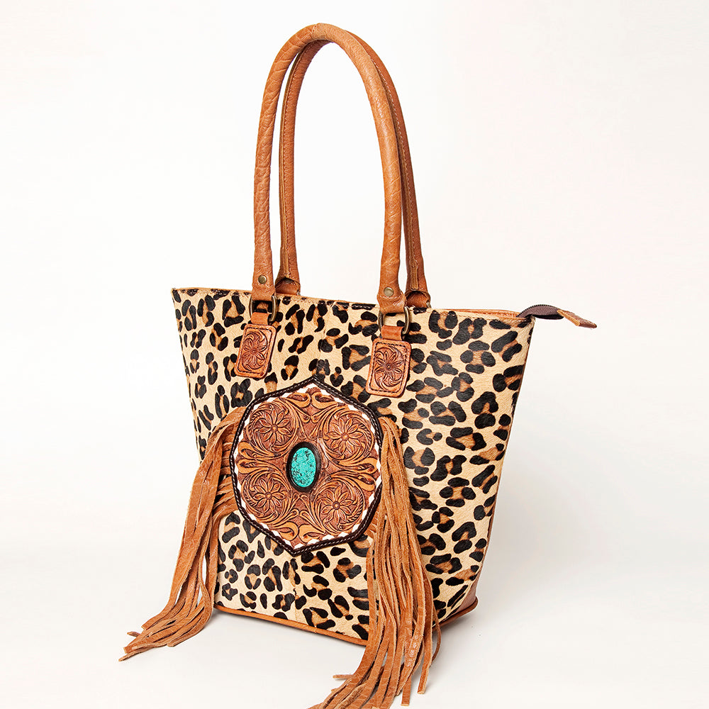 LC-ADBGA208 Hair-On Cowhide Tote with Tooled Leather Medallion, Fringe & Turquoise Accent