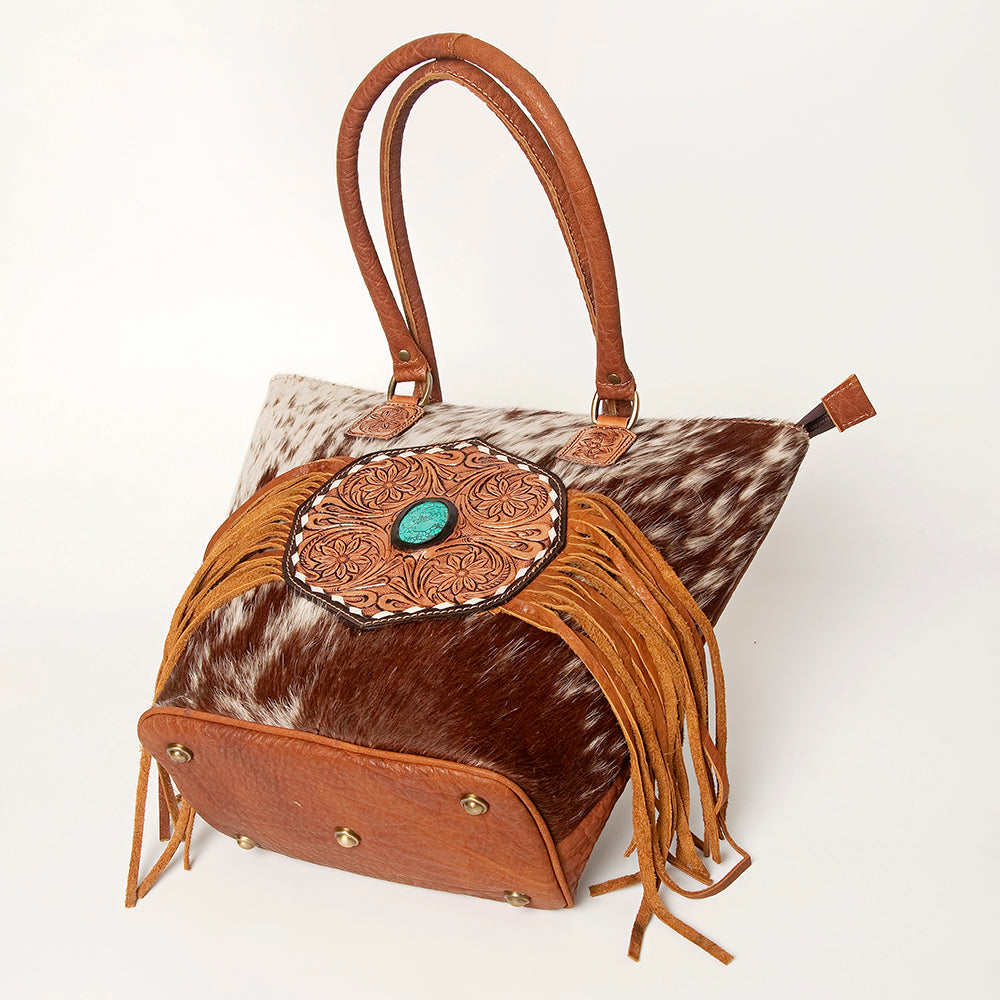 LC-ADBGA208 Hair-On Cowhide Tote with Tooled Leather Medallion, Fringe & Turquoise Accent