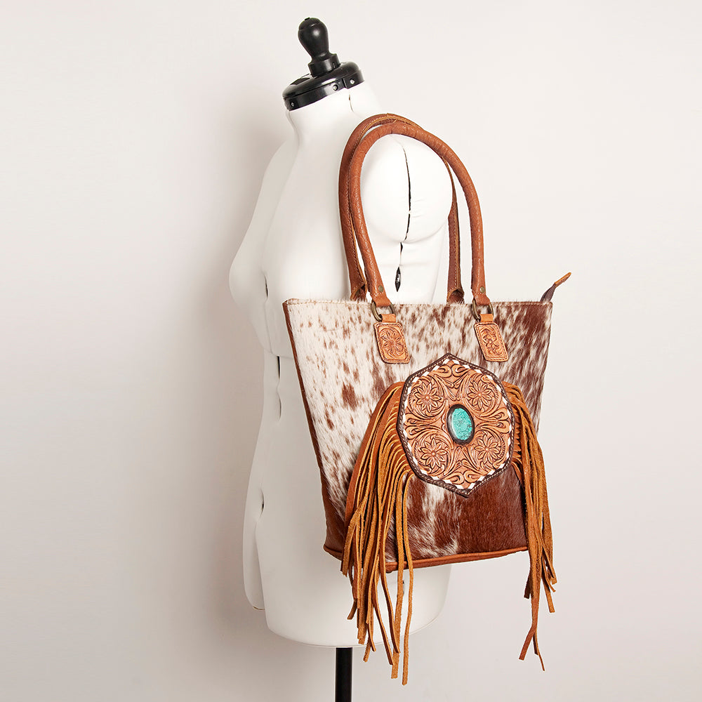 LC-ADBGA208 Hair-On Cowhide Tote with Tooled Leather Medallion, Fringe & Turquoise Accent