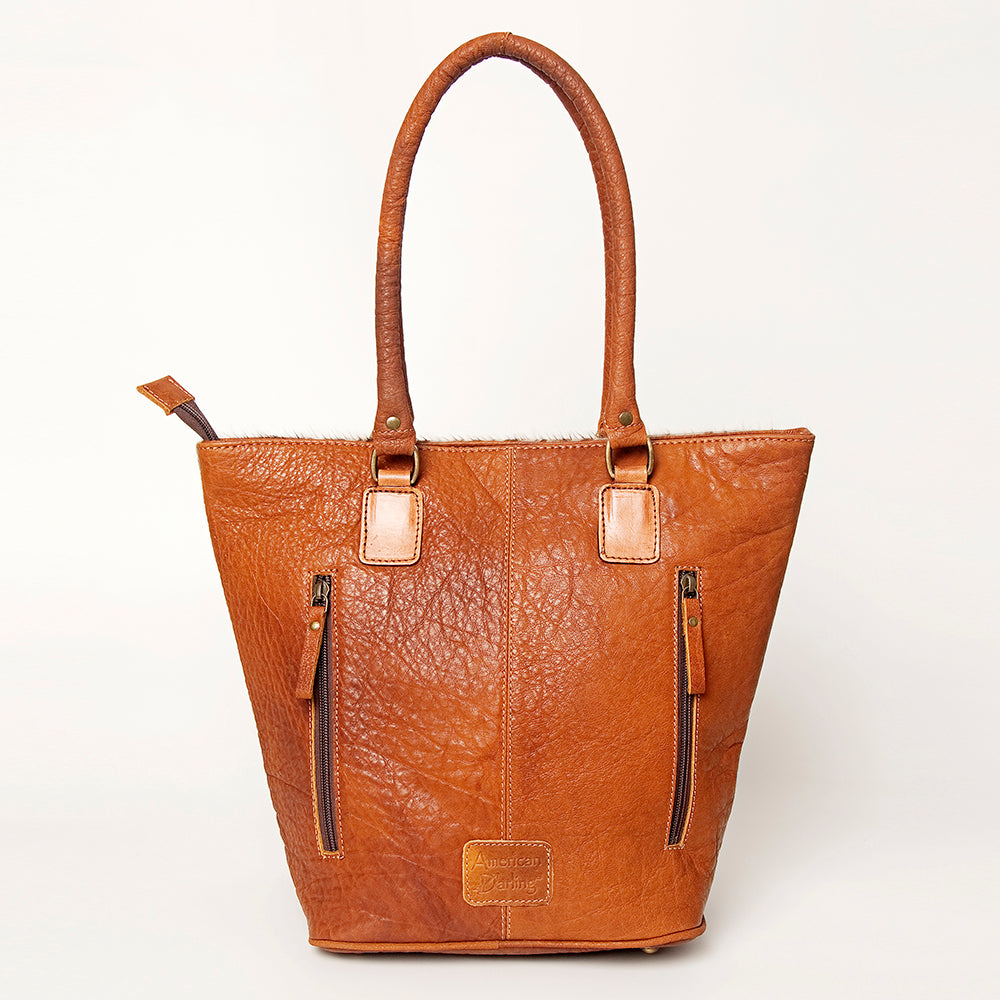 LC-ADBGA208 Hair-On Cowhide Tote with Tooled Leather Medallion, Fringe & Turquoise Accent
