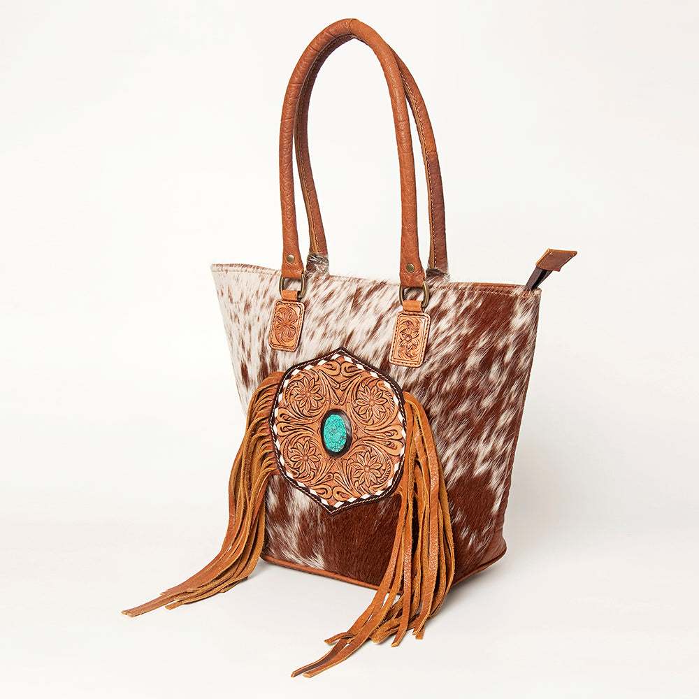 LC-ADBGA208 Hair-On Cowhide Tote with Tooled Leather Medallion, Fringe & Turquoise Accent