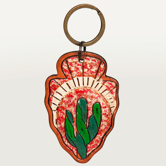 LC-ADKR207 Hand-Tooled Leather Keyring   Arrowhead Shape with Green Cactus & Red Speckled Background