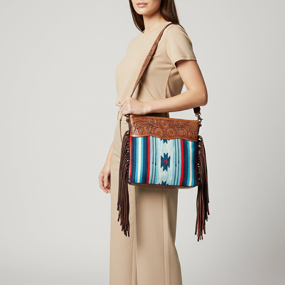 LC-ADBGZ557A Southwestern Woven & Tooled Leather Fringe Crossbody Bag - Blue Serape with Floral Tooled Strap