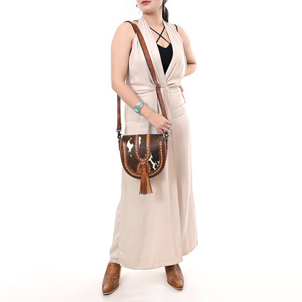 ADBG1610 Hair-On Cowhide Saddle Crossbody Bag with Leather Tassel & Western Stitching