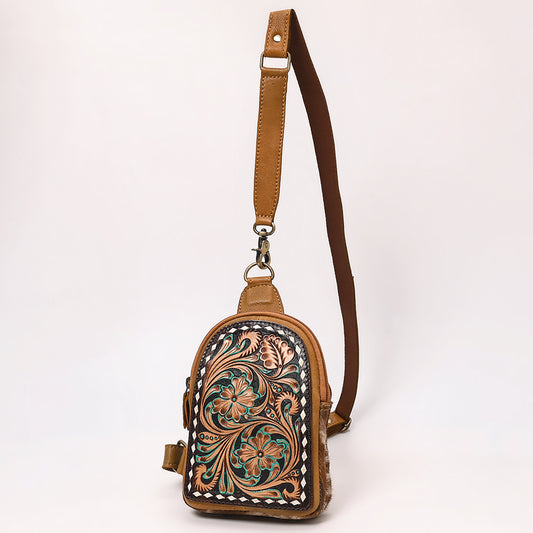 ADBGA652 Floral Tooled Leather & Cowhide Sling Backpack with Teardrop Panel Design