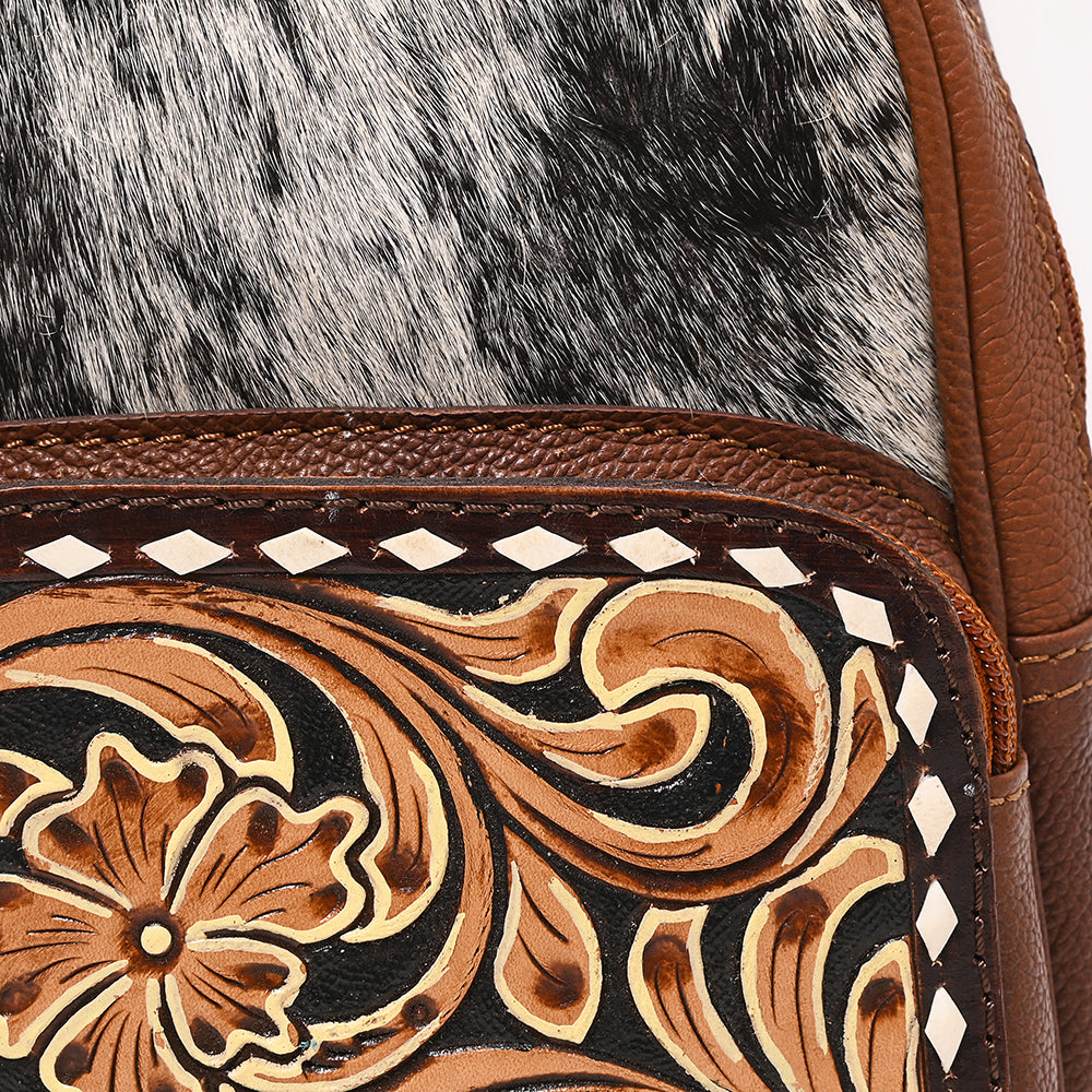 ADBGA654 Tooled Leather & Cowhide Sling Bag with Floral Front Pocket and Whipstitch Trim