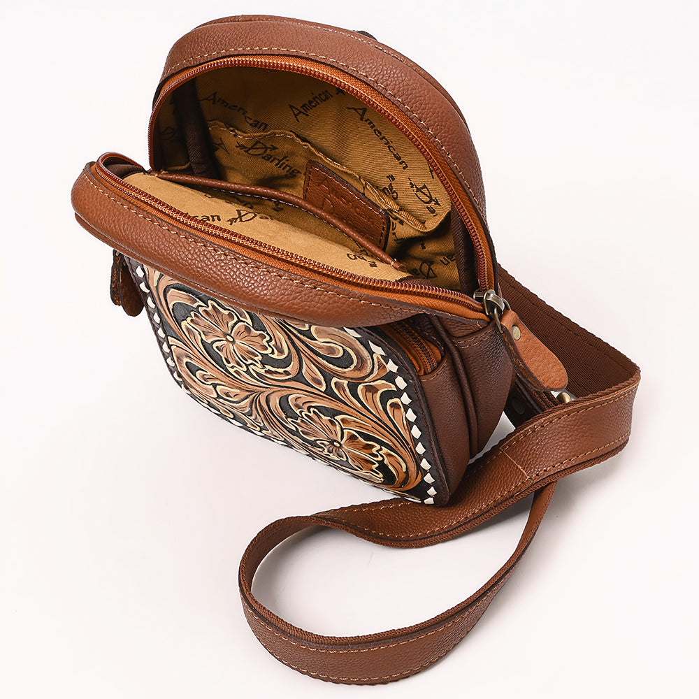 ADBGA654 Tooled Leather & Cowhide Sling Bag with Floral Front Pocket and Whipstitch Trim