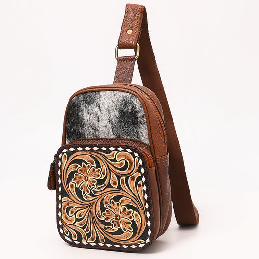 ADBGA654 Tooled Leather & Cowhide Sling Bag with Floral Front Pocket and Whipstitch Trim