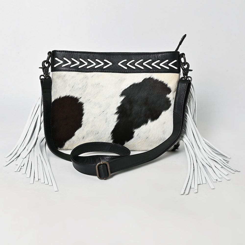 ADBG1628 Black & White Cowhide Leather Crossbody Bag with White Fringe and Arrow Stitch Detail