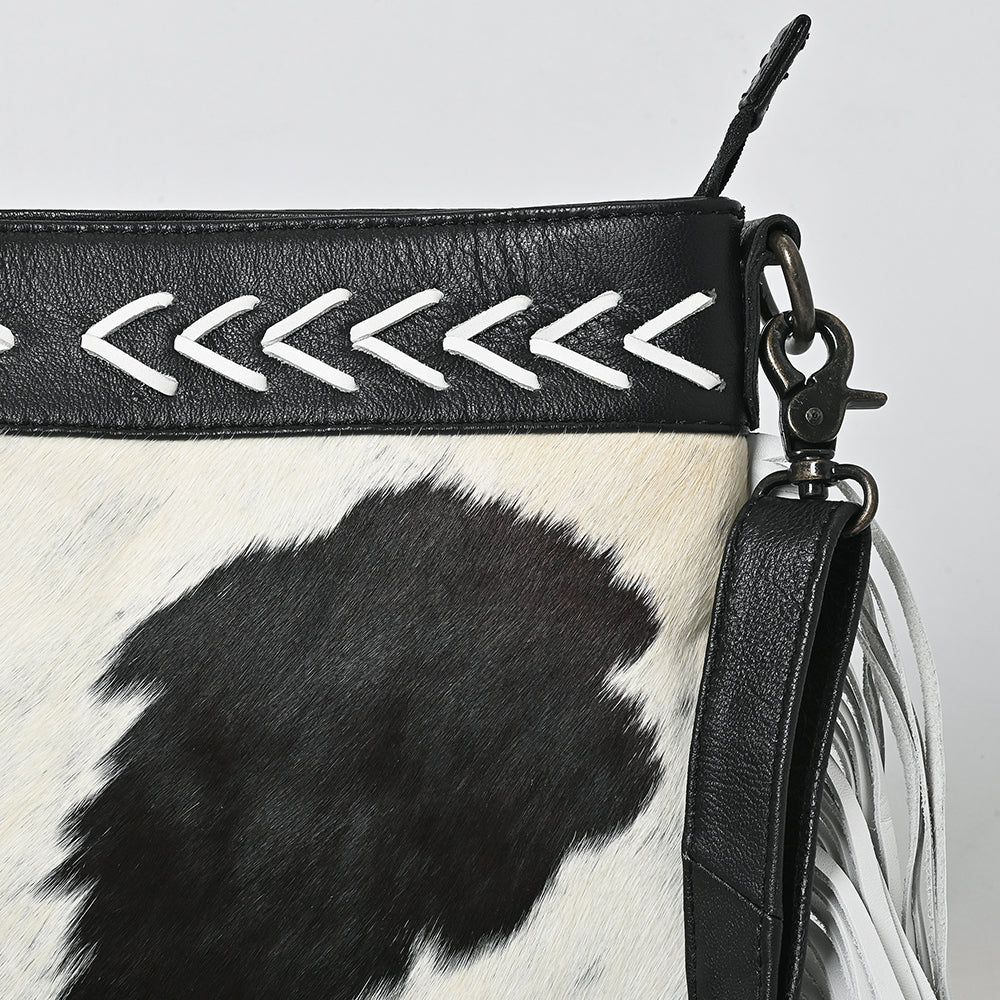 ADBG1628 Black & White Cowhide Leather Crossbody Bag with White Fringe and Arrow Stitch Detail