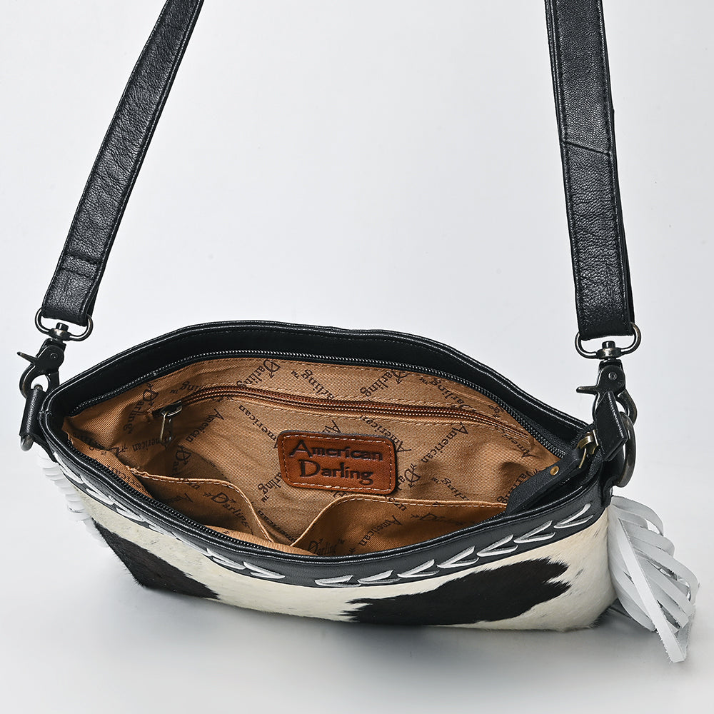 ADBG1628 Black & White Cowhide Leather Crossbody Bag with White Fringe and Arrow Stitch Detail