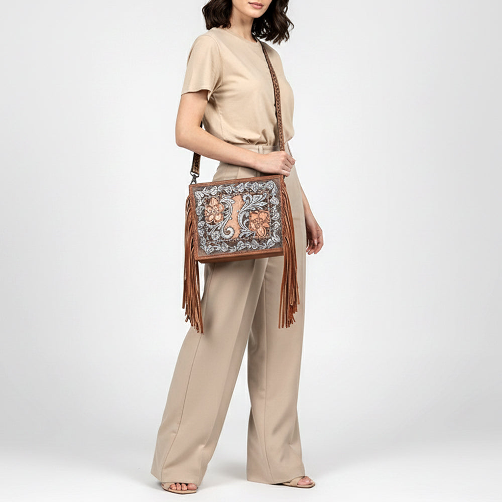 ADBG1632 Tooled Leather Crossbody Bag with Floral Inlay, Fringe, and Hand-Carved Strap