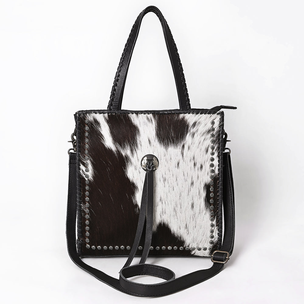ADBG1751 Black & White Cowhide Leather Tote Bag with Silver Stud Accents and Concho Tassel