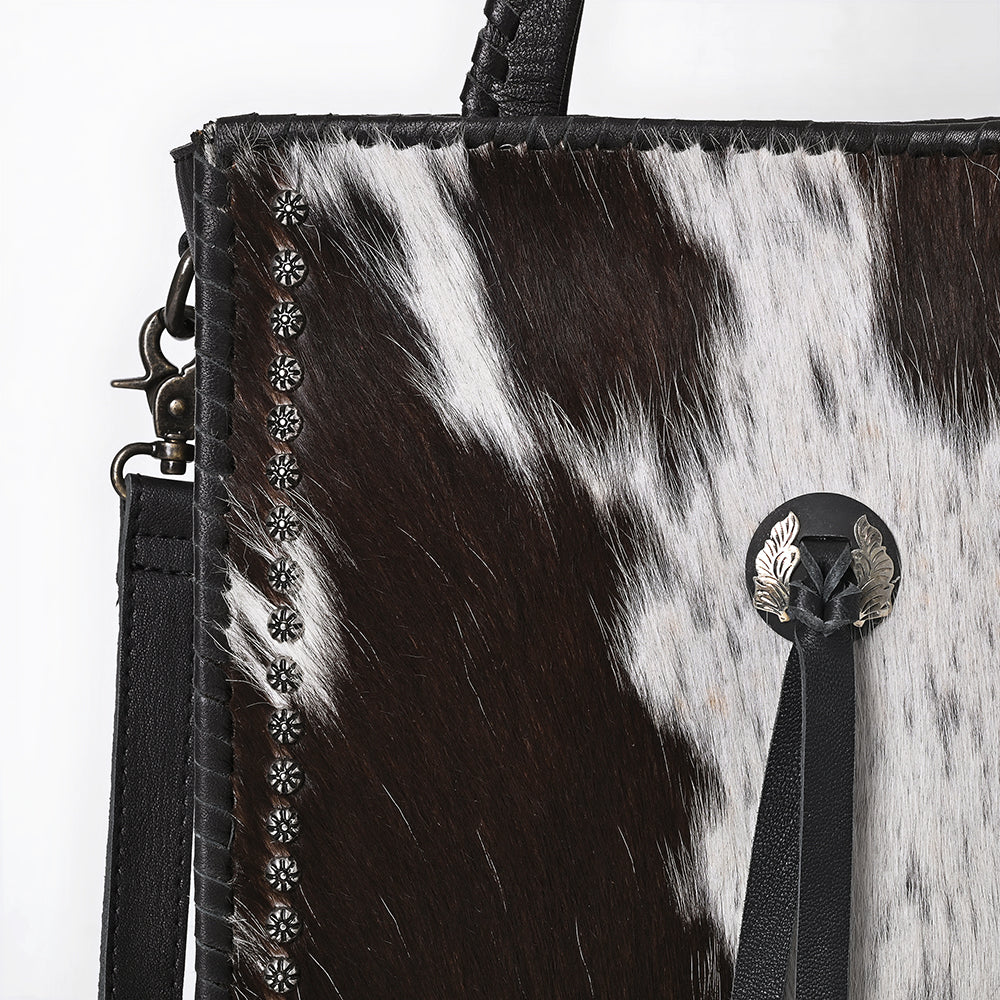 ADBG1751 Black & White Cowhide Leather Tote Bag with Silver Stud Accents and Concho Tassel